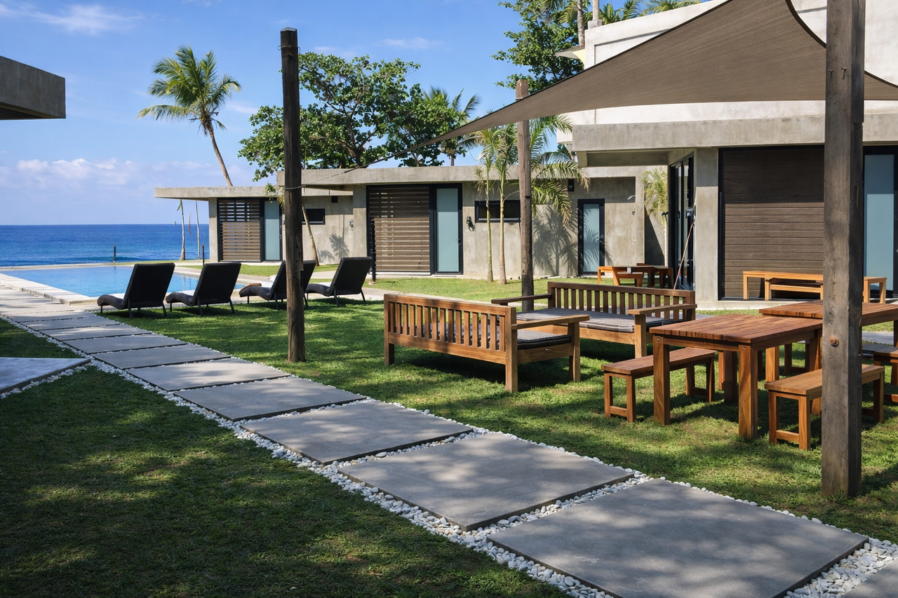 Shared lounge and dining area on the lawn by the Shoreline cabins and pool