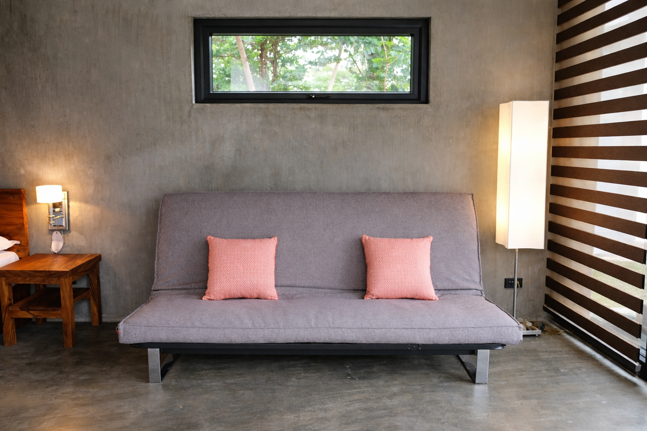 The queen convertible sofa bed in a Shoreline cabin