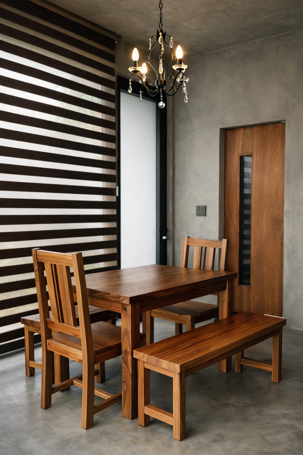 A solid hardwood dining table, chairs, and bench in a Shoreline cabin